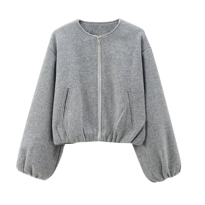 Women's beige cropped zip-up jacket with relaxed balloon sleeves for effortless layering