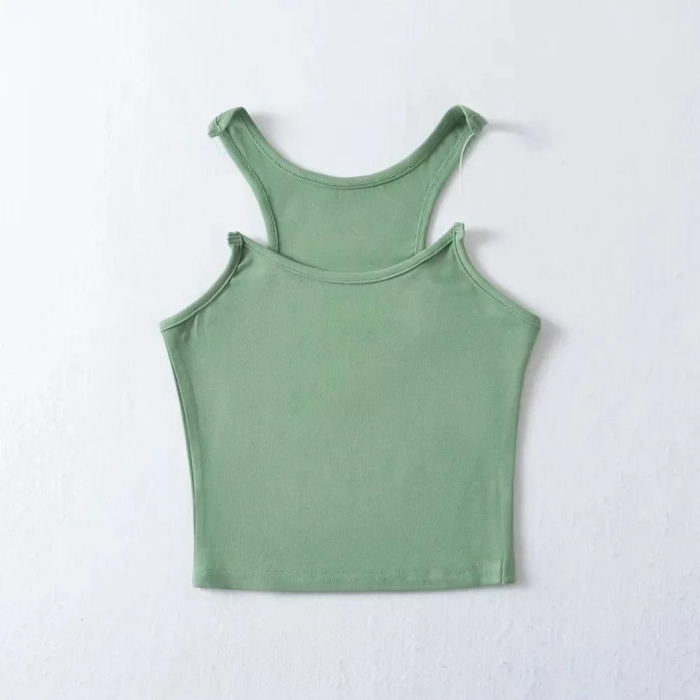 White sleeveless tank top with invisible straps, slimming fit, lightweight and perfect for layering