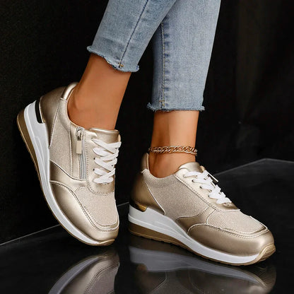 Women's metallic silver platform sneakers with lunar-shine upper and chunky sole by Wavlynn
