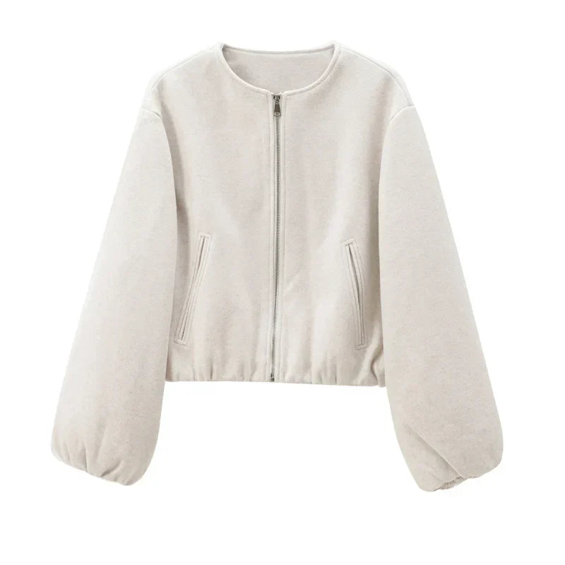 Women's cropped zip-up jacket with balloon sleeves, modern minimalist style for effortless layering