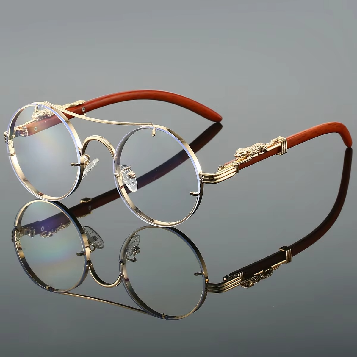Vintage round unisex sunglasses gold tone double bridge frame red tinted lenses retro style