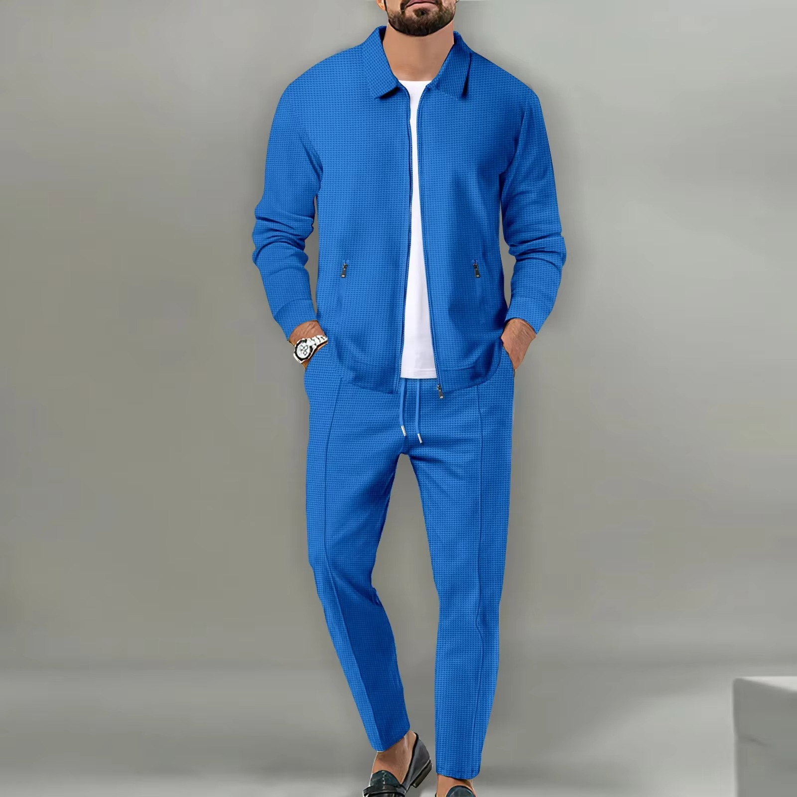 Men's two-piece polo jacket shirt and matching drawstring pants set in coordinated everyday comfort style