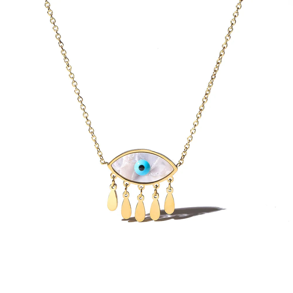 Dainty gold evil eye talisman necklace with mystical charm and protective symbolism
