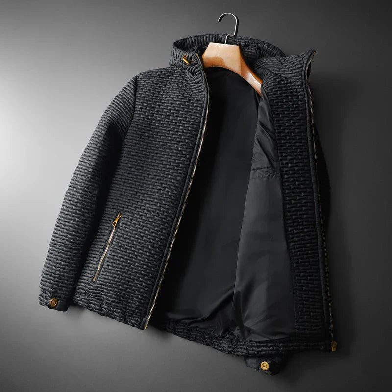 Black micro-quilted hooded jacket with embossed pattern and gold-plated hardware, lightweight casual fit