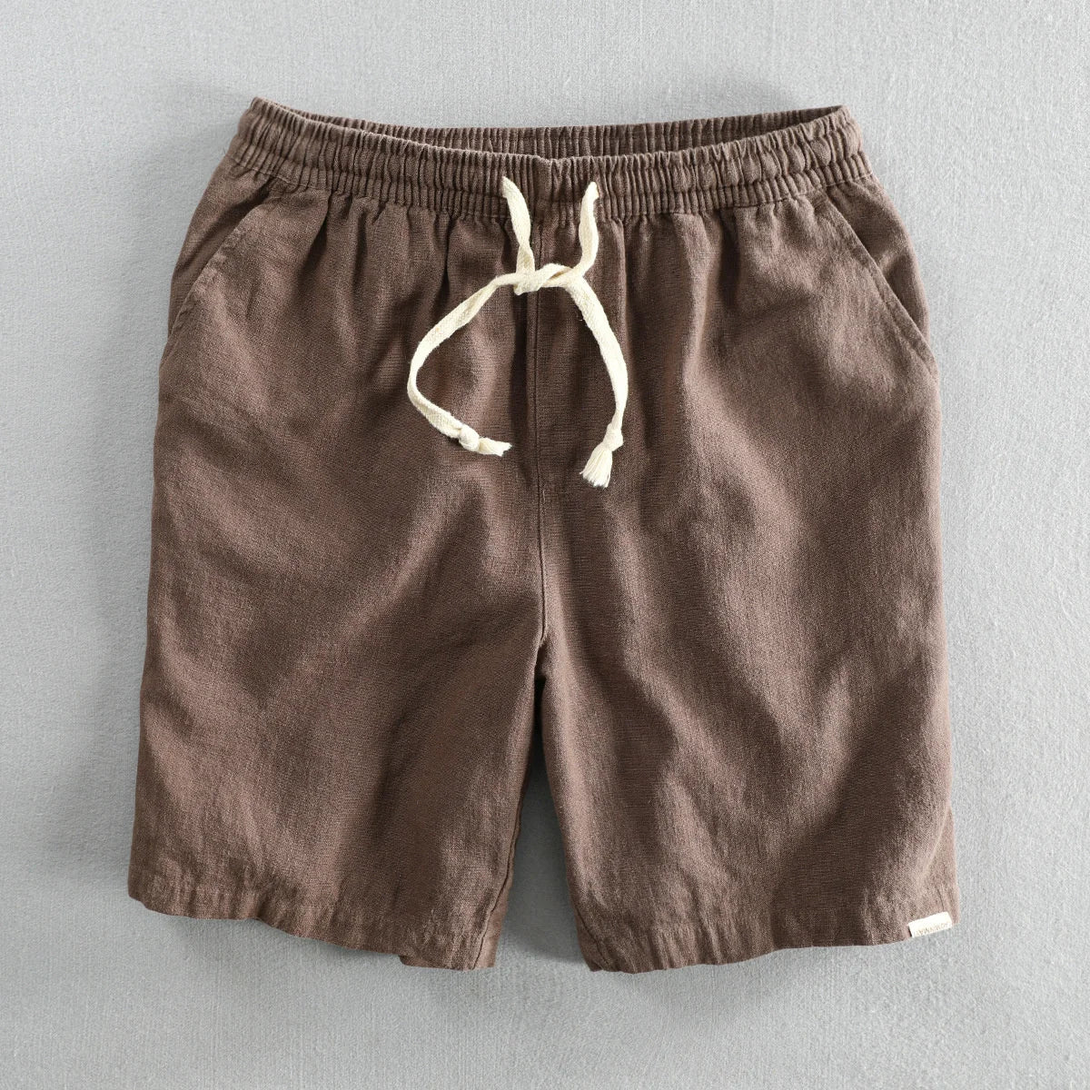 Men's beige cotton-linen tailored shorts with adjustable drawstring waist for summer style