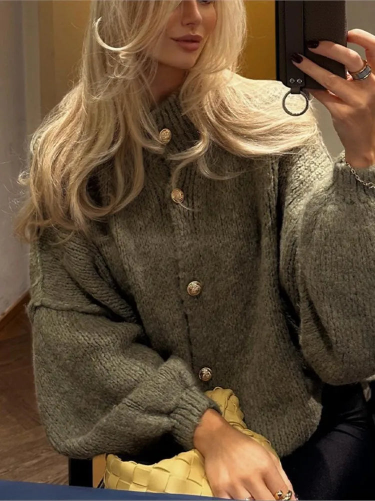 Women's oversized chunky knit button cardigan relaxed fit cozy winter layering essential