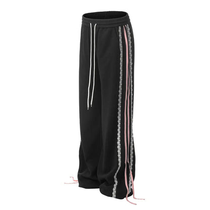 Striped loose-fit cotton sweatpants with floral lace stripe details and drawstring midrise waist