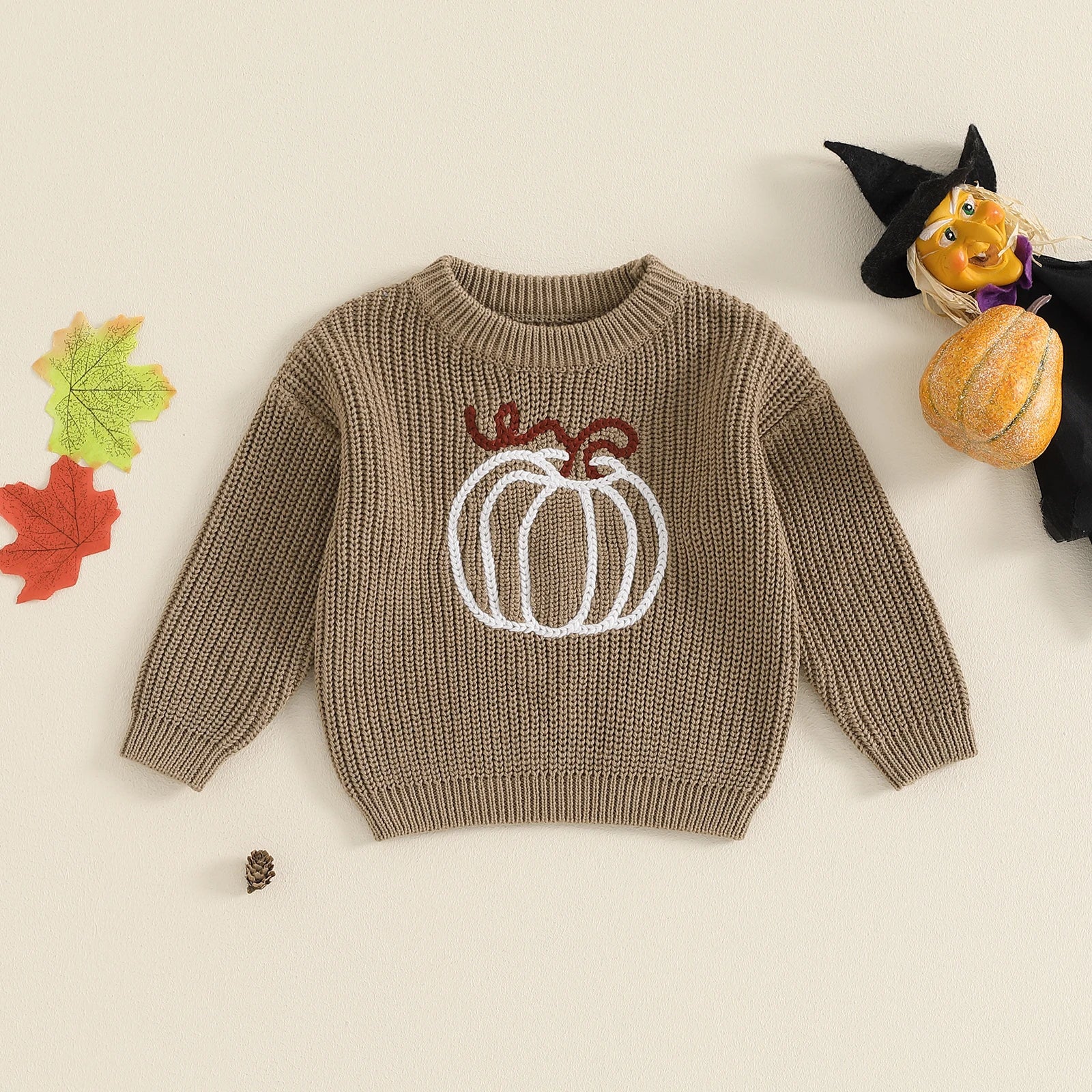 Kids orange Halloween knit sweater with long sleeves and pumpkin ghost embroidery detailing