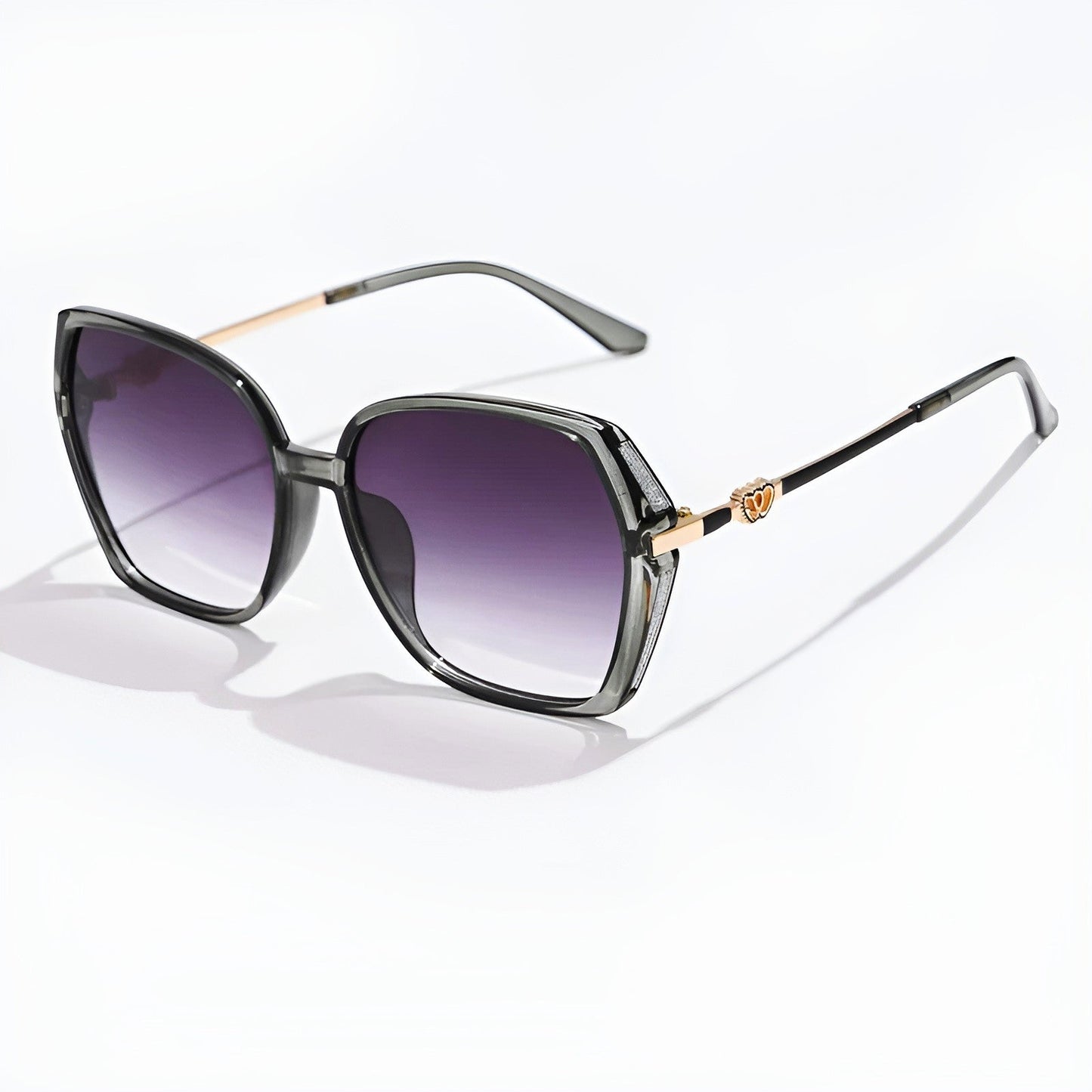 Oversized metal alloy sunglasses with gradient color lens finish and UV protection