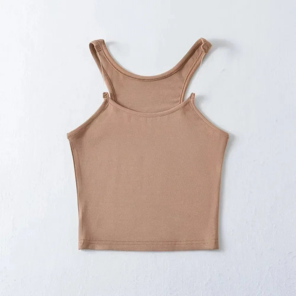 White sleeveless tank top with invisible straps, slim flattering fit, lightweight breathable fabric