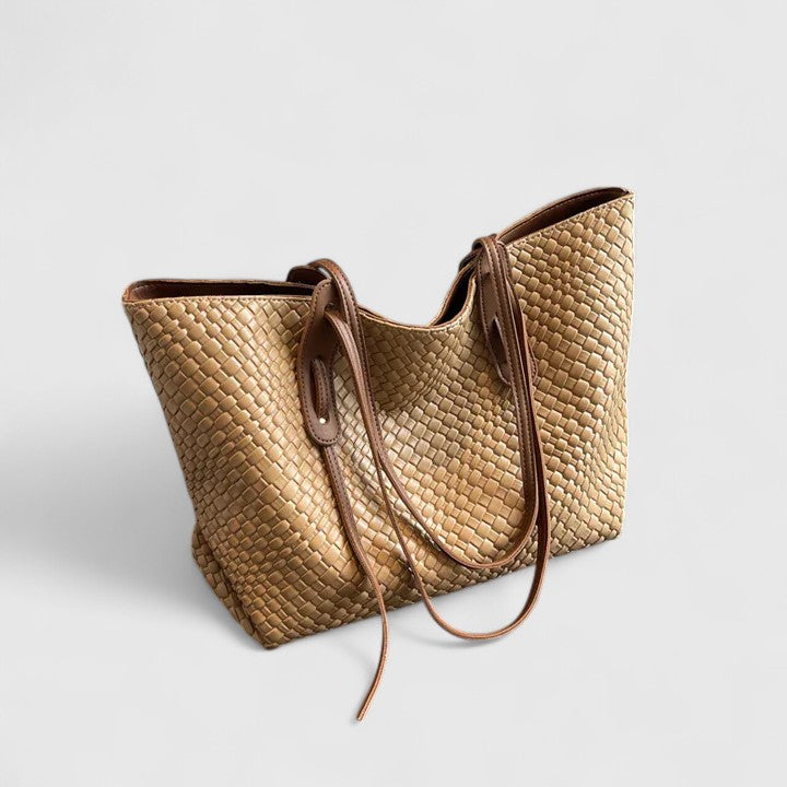 Classic woven tote bag with elegant timeless pattern, spacious design and long comfortable straps