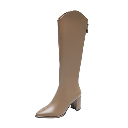 Women's knee-high heeled boots in sleek silhouette with mid-height block heel for polished everyday style