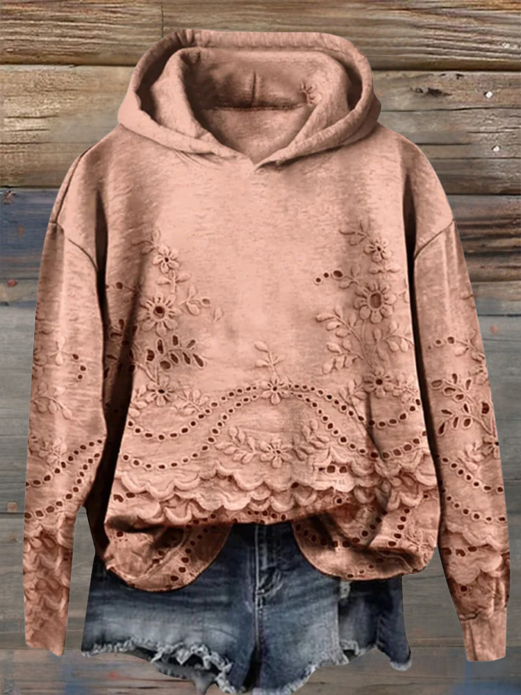 Relaxed-fit floral embroidered hoodie in soft tones with delicate feminine stitching detail