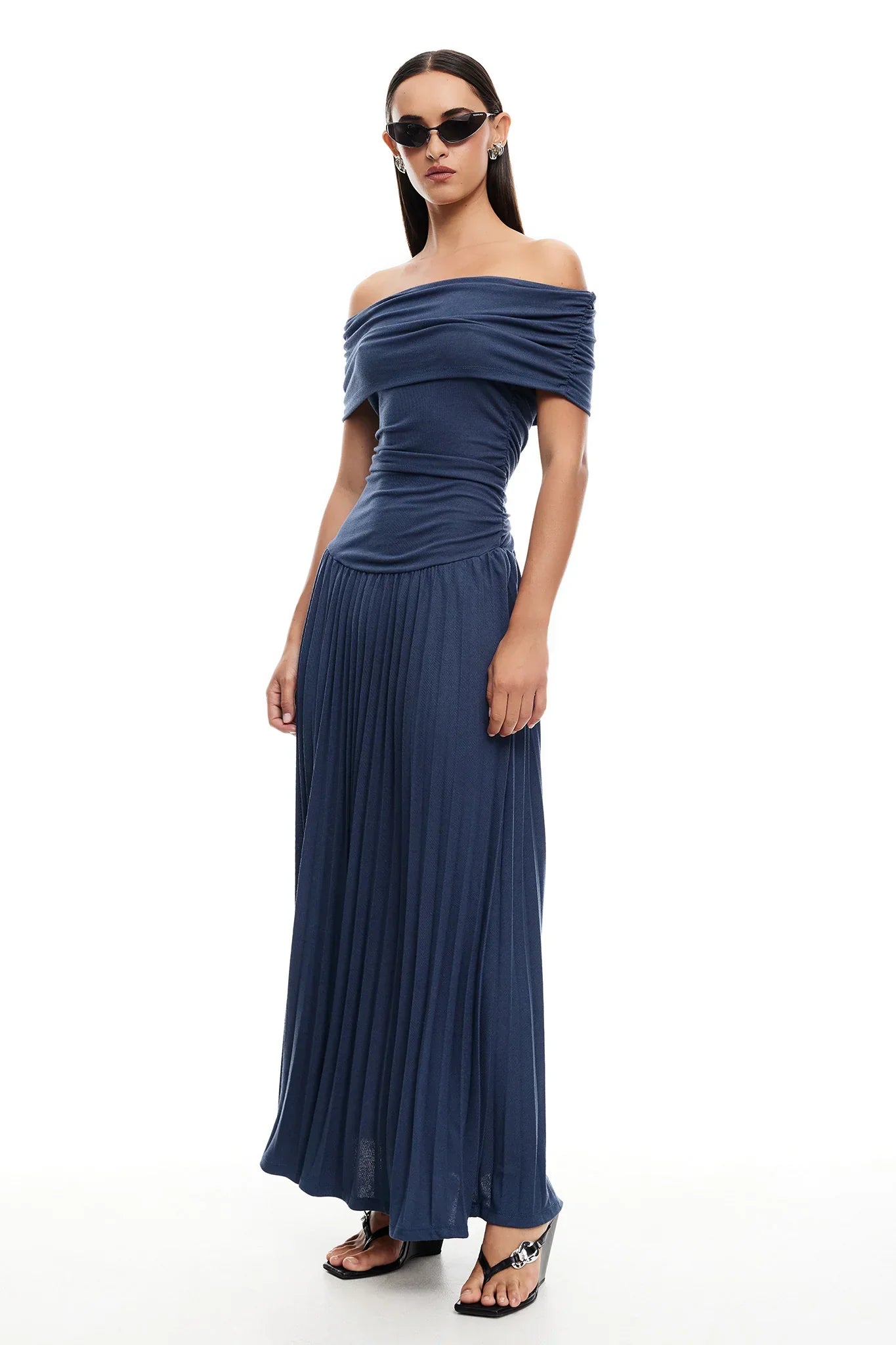 Flowy white maxi dress with airy silhouette and effortless drape for summer style