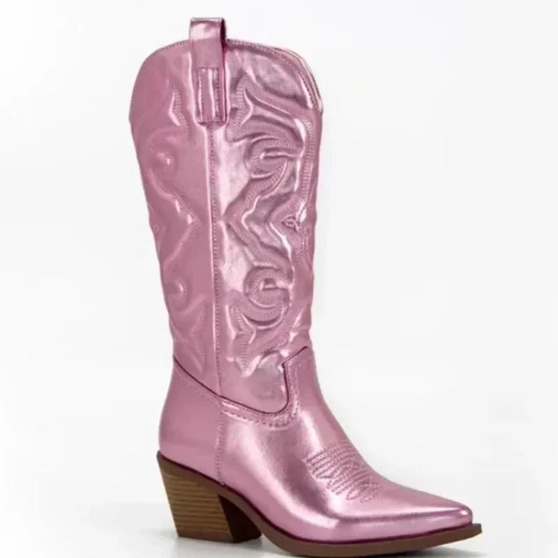 Women's leather knee-high boots with Western-inspired stitching details and a sleek heeled silhouette