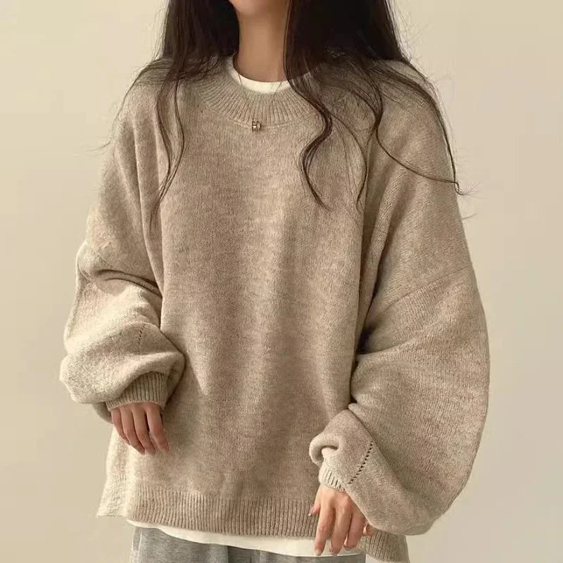 Cream oversized knit sweater relaxed fit long sleeves cozy winter layering essential