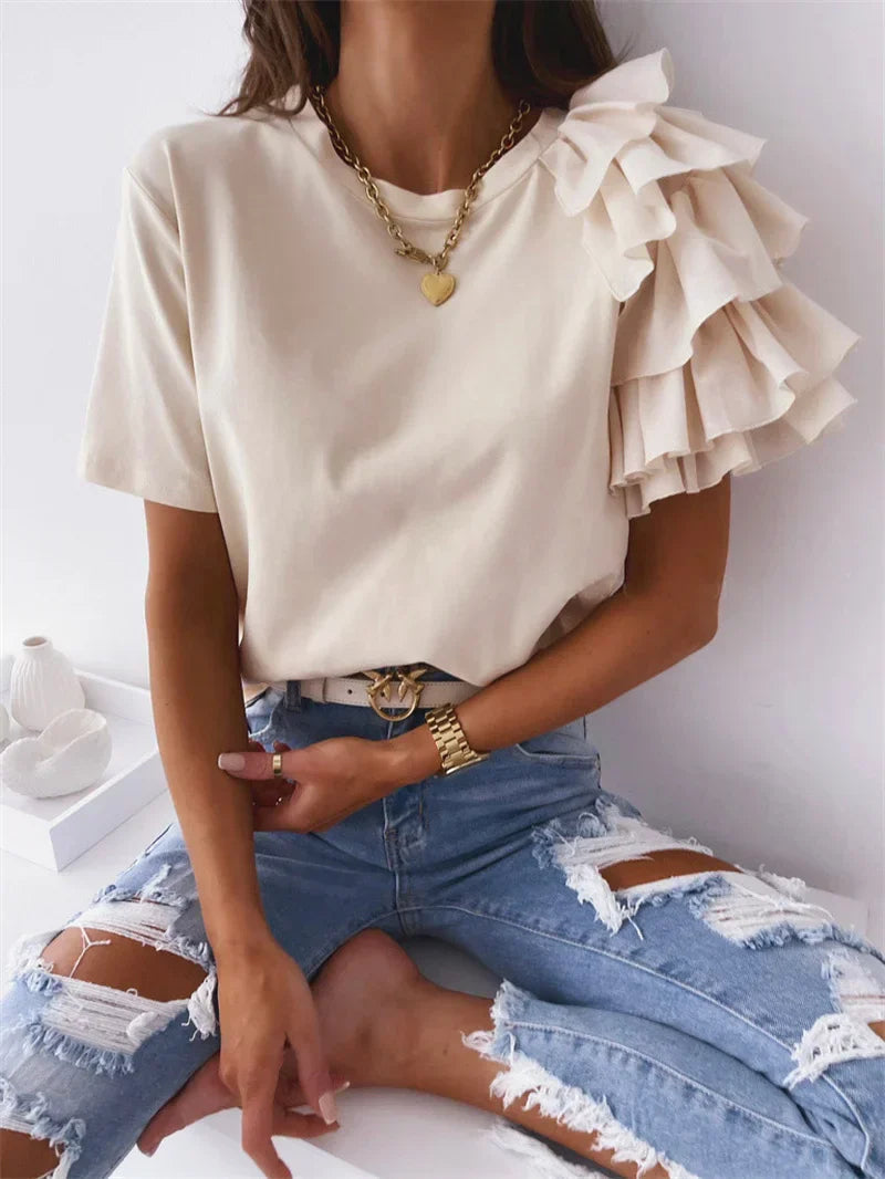 White chic ruffle sleeve top with relaxed fit and bold statement silhouette for women
