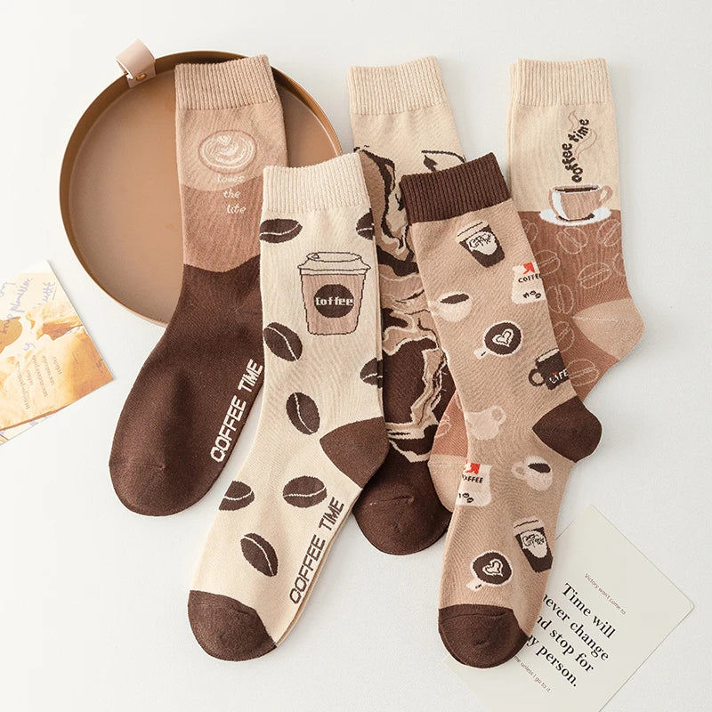 Cozy cotton crew socks with playful coffee cup print, perfect quirky accessory for caffeine lovers