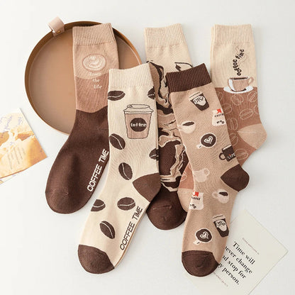 Cozy cotton crew socks with playful coffee cup print, perfect quirky accessory for caffeine lovers