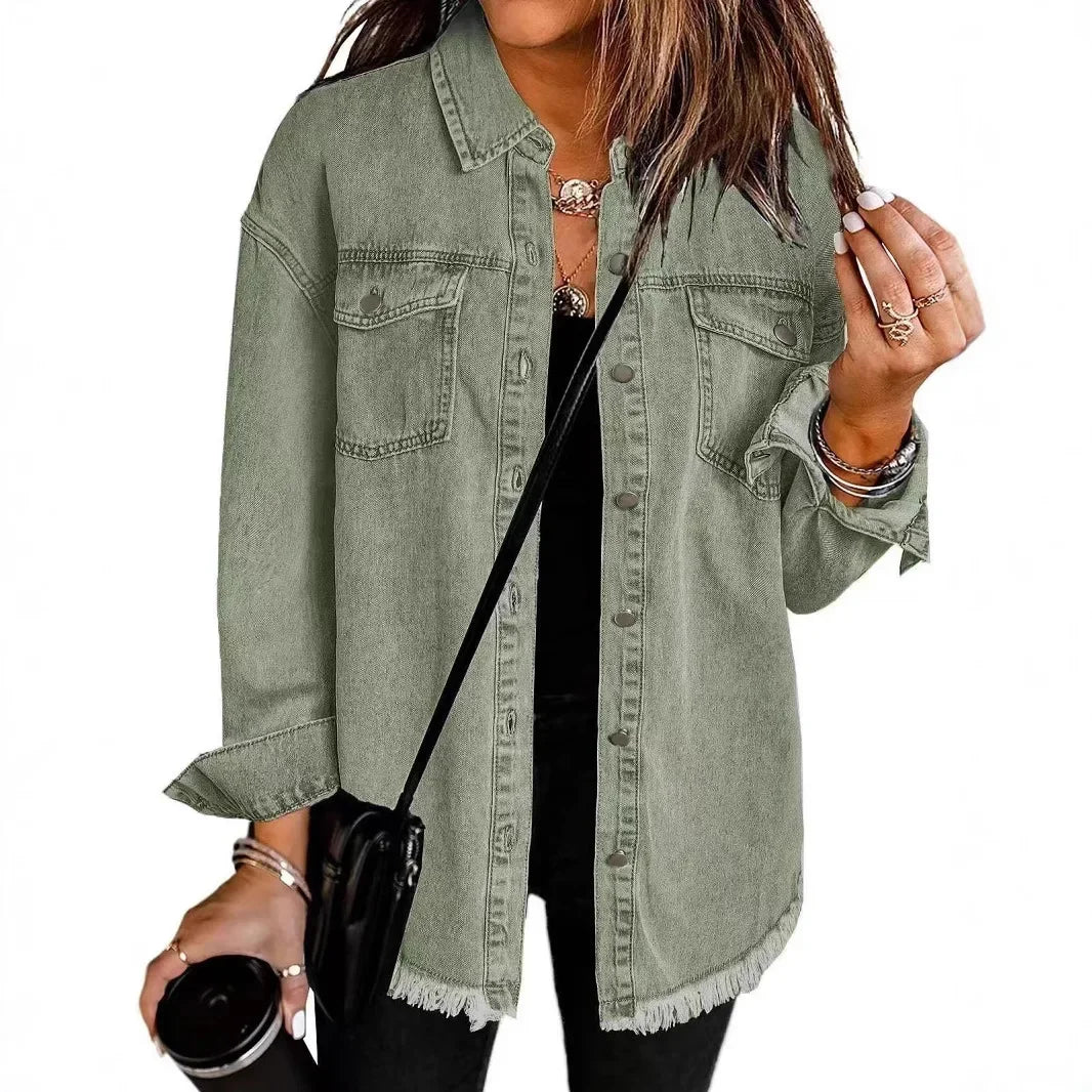 Light wash denim shirt jacket with relaxed fit and raw fringe hem for effortless casual layering
