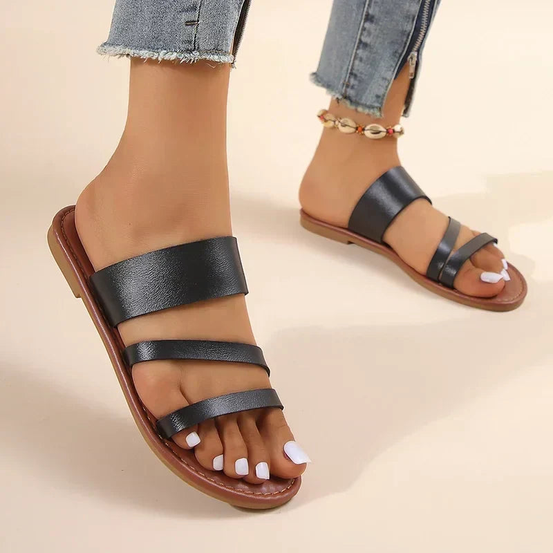 Lilac flat cushioned sandals for women with minimalist design and soft cushioned footbed