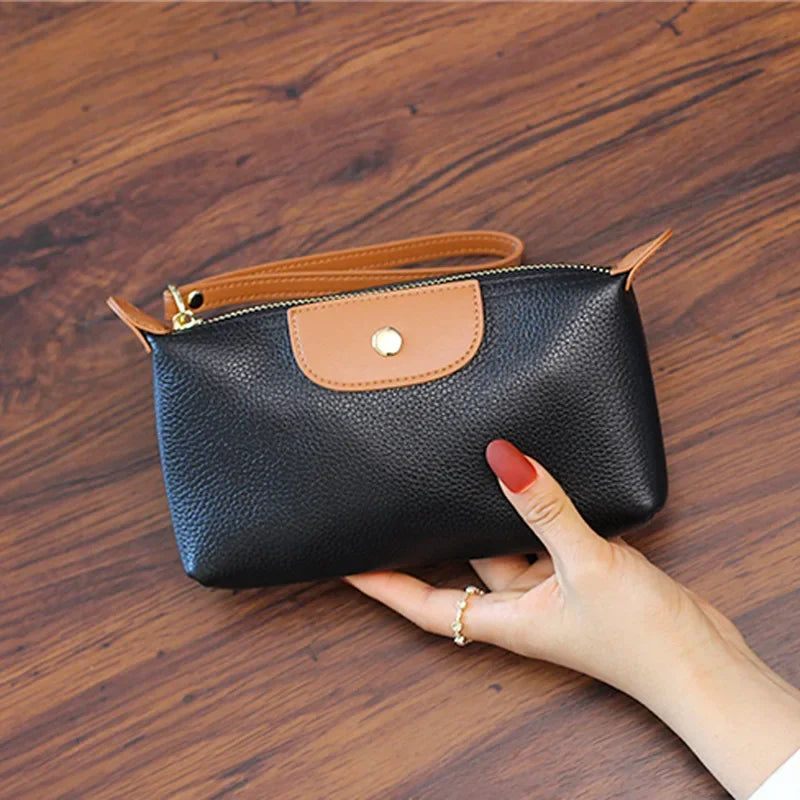 Wavlynn Anne pebbled vegan leather wristlet clutch bag with zipper closure, compact structured design