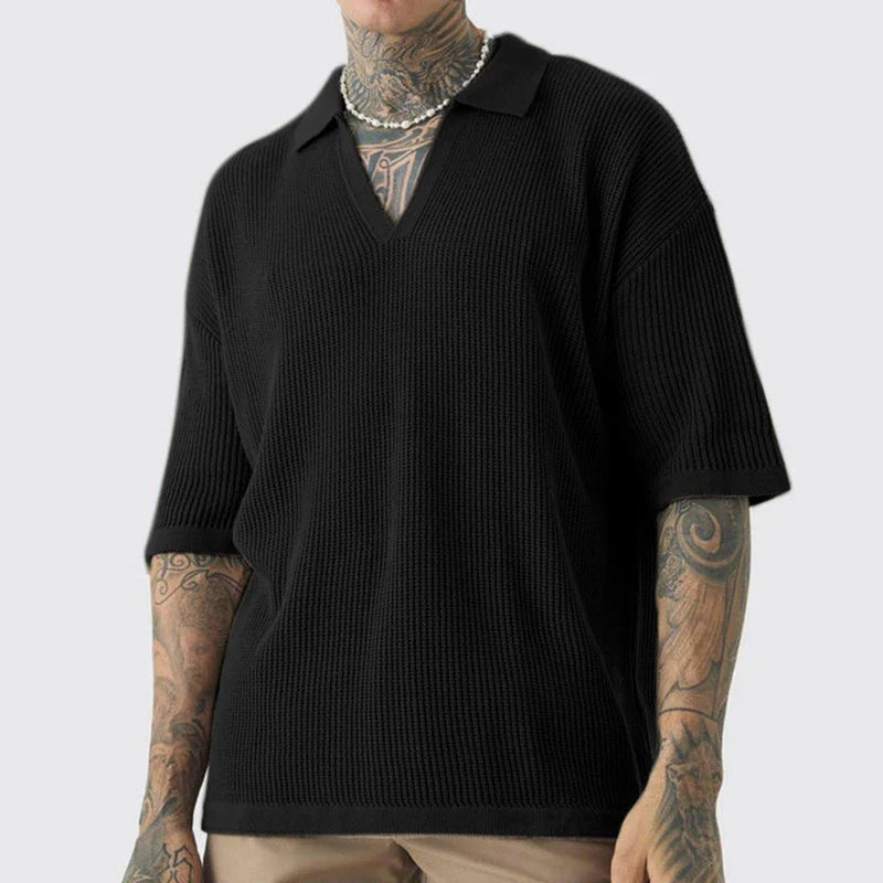 Beige oversized boxy knit polo shirt with honeycomb texture, V-neck flat collar, short sleeves