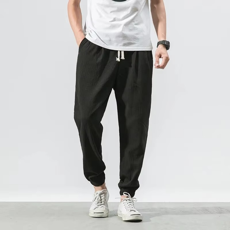 Men's relaxed-fit cotton linen harem pants in neutral tone with cuffed ankles for casual everyday wear