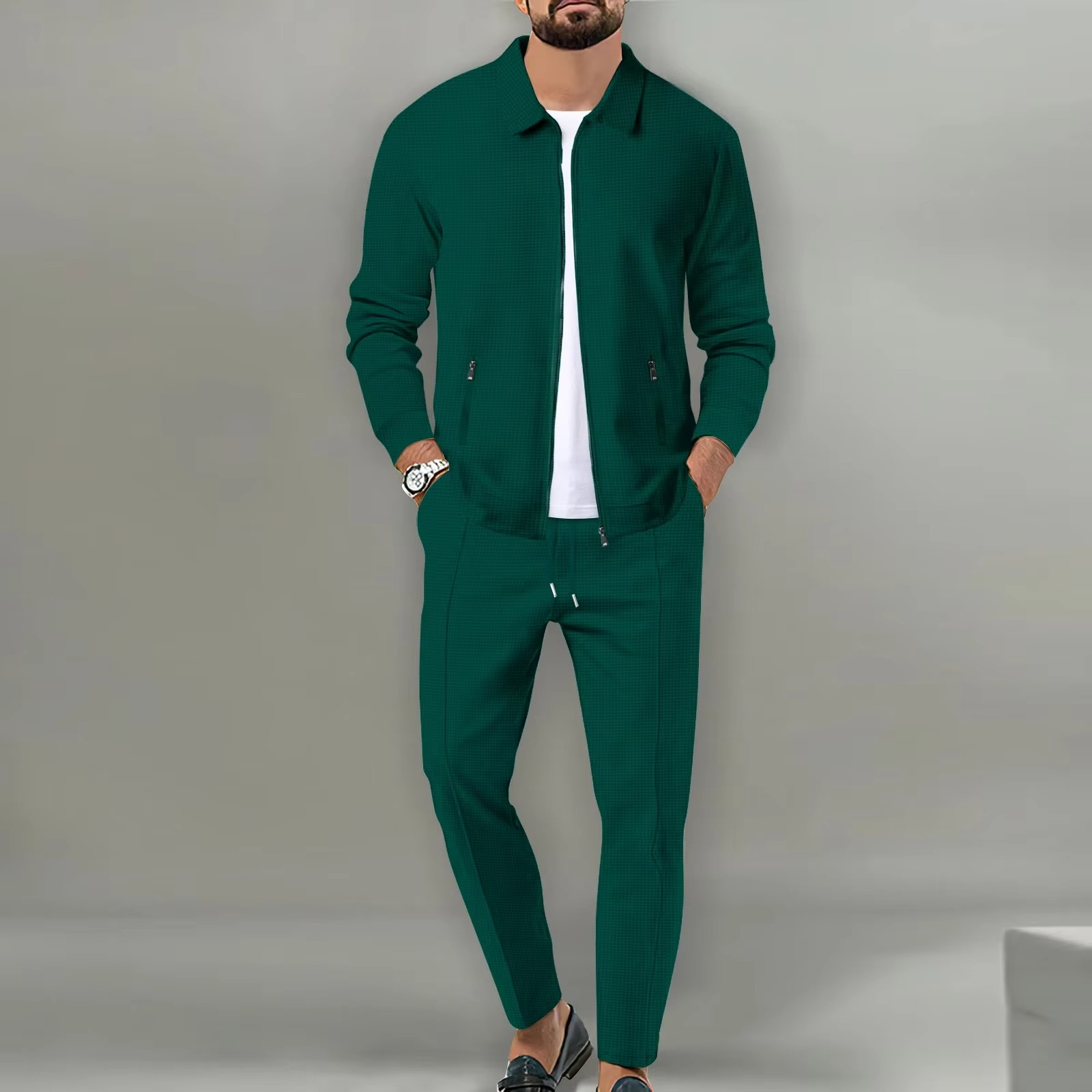 Men's two-piece polo jacket shirt and matching drawstring pants set in coordinated everyday comfort style