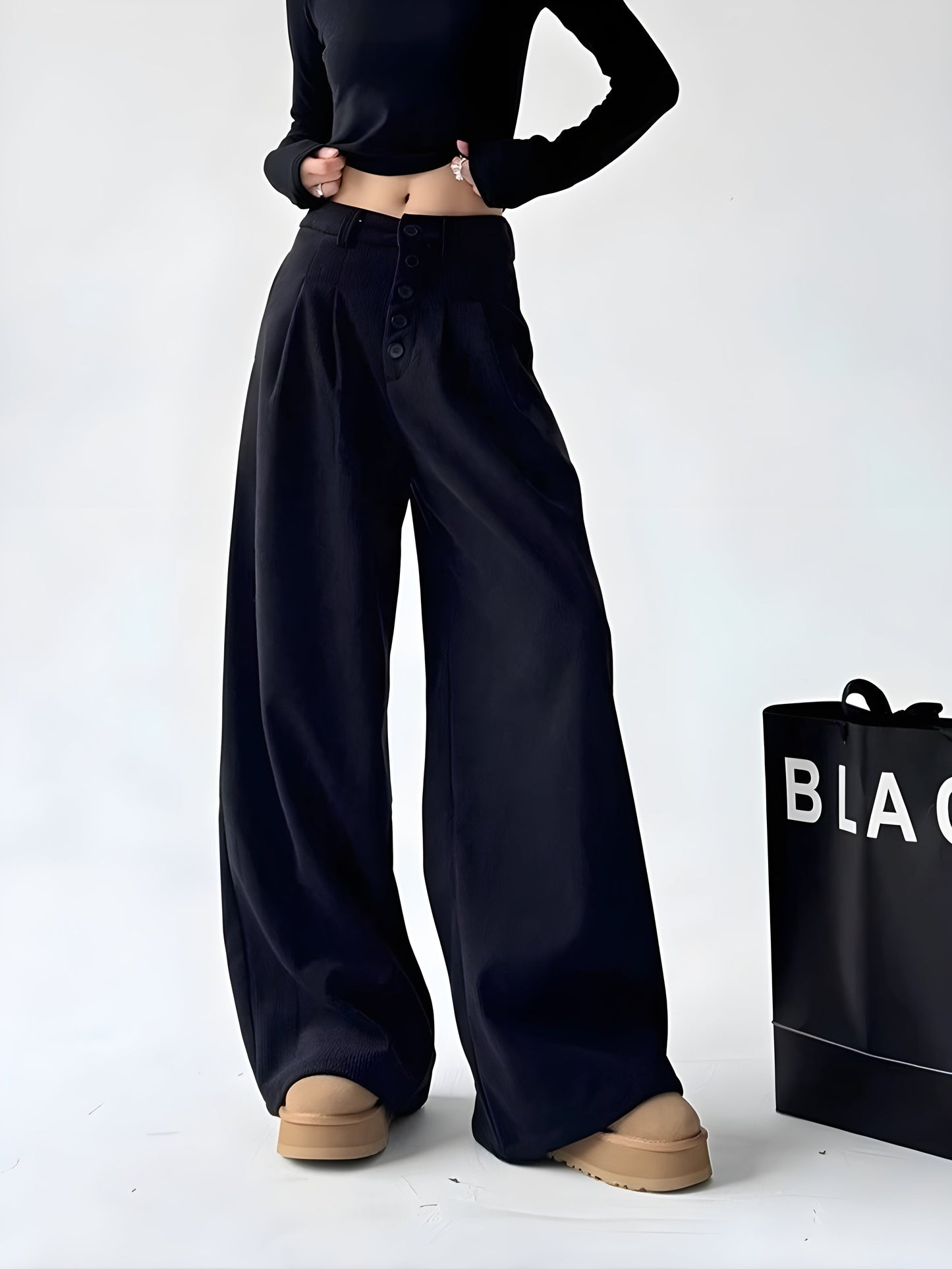 Solid corduroy palazzo pants high-waist pleats wide-leg cut bold button closure casual chic
