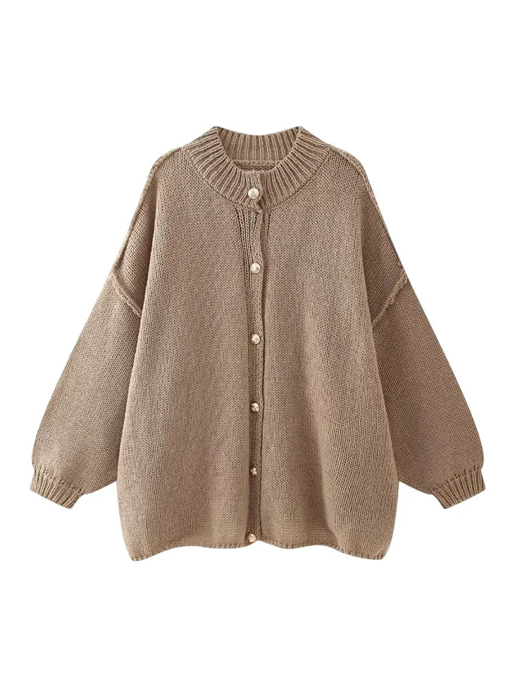 Women's oversized button-down cardigan relaxed silhouette versatile layering staple year-round