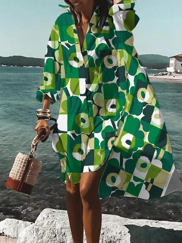 Floral printed oversized midi shirt dress in vibrant summer colors with relaxed silhouette