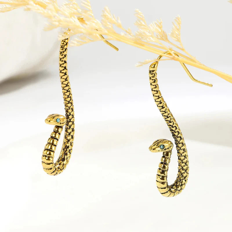 Seraphine sculpted snake earrings with high-polish finish, bold serpent silhouette, lightweight push-back closure