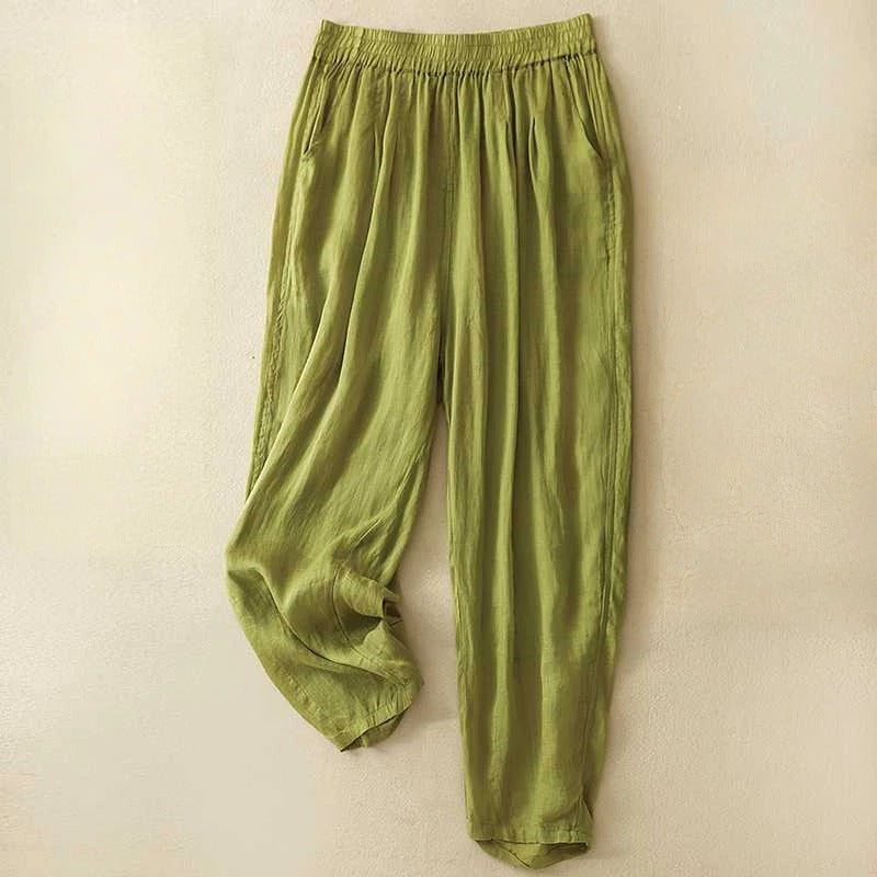Sage green wide-leg linen blend pants with elastic gathered waist and side pockets