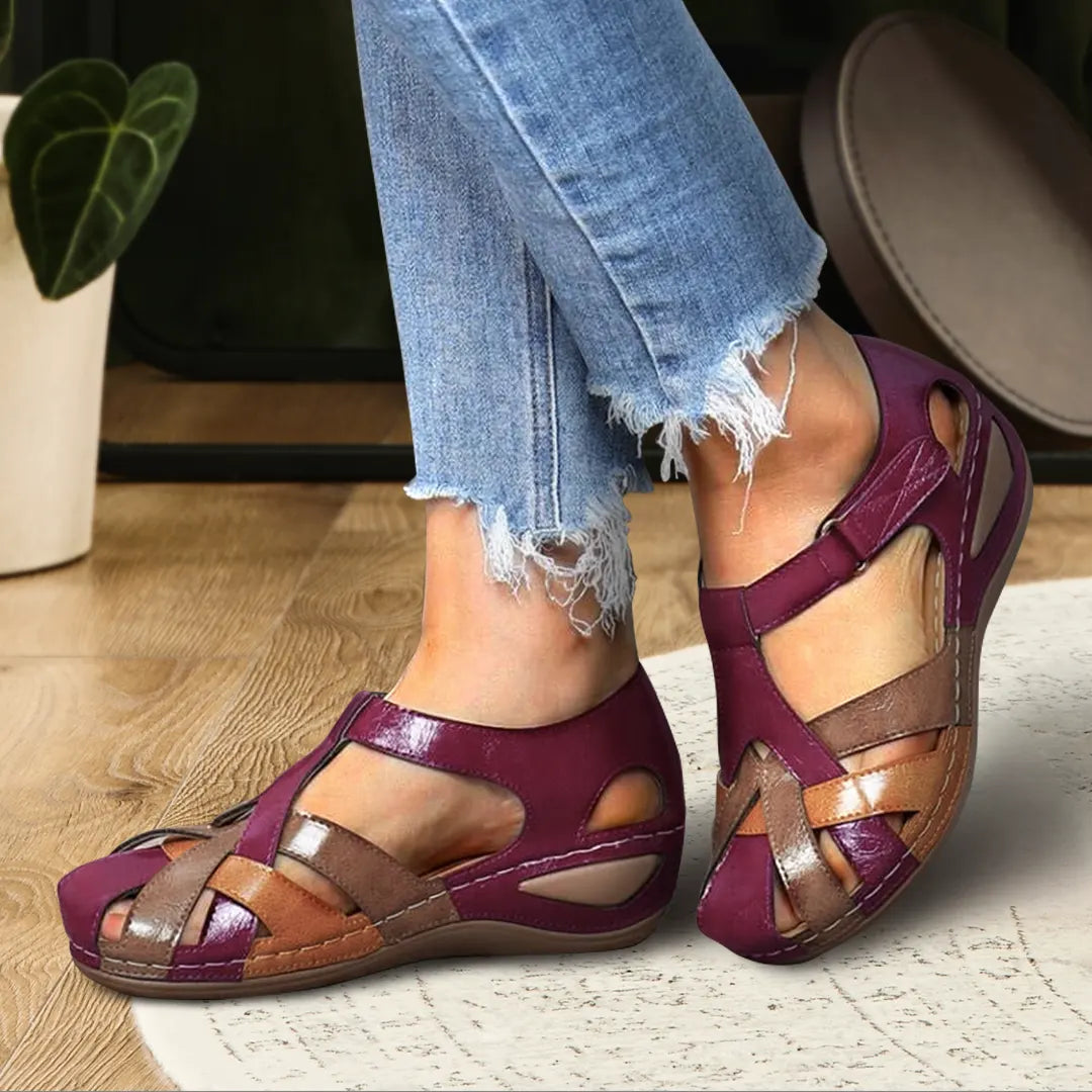 Women's comfort sandals in neutral tones with sleek contemporary lines and cushioned supportive sole