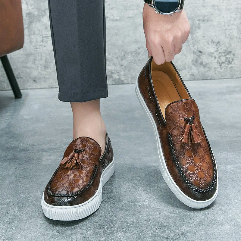 Brown genuine leather loafers with embossed checkered pattern and hand-braided tassel detail