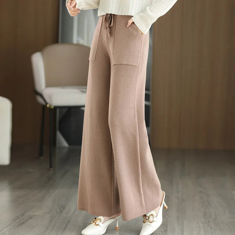 High waisted wide-leg wool pants with relaxed silhouette and flattering high-rise waistband