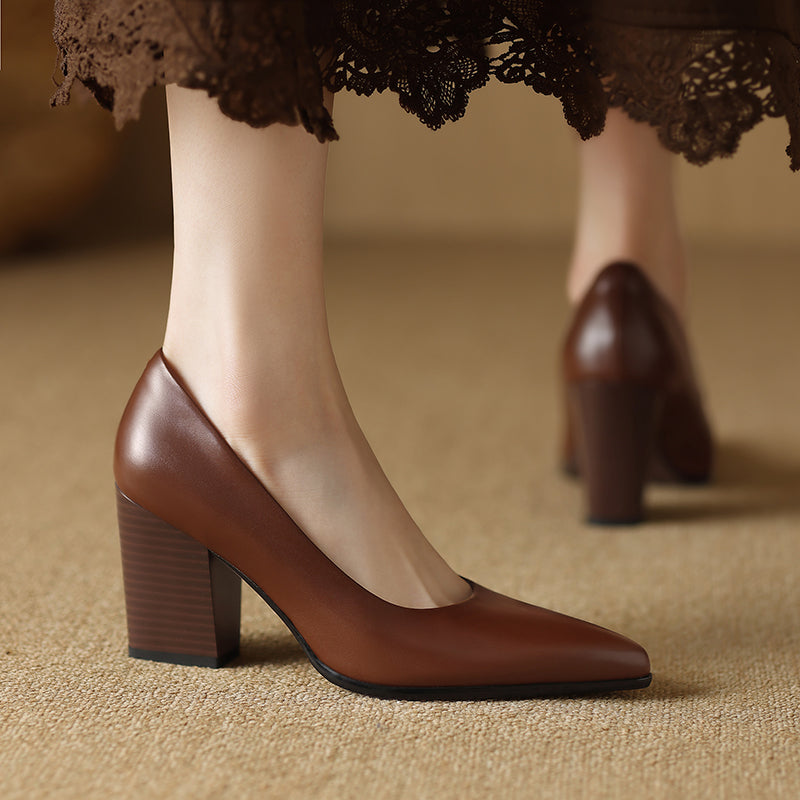 Women's black pointed toe block heel pumps slip-on style sleek structured upper minimalist silhouette