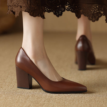 Women's black pointed toe block heel pumps slip-on style sleek structured upper minimalist silhouette