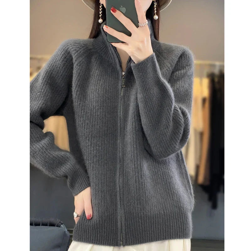 Charlotte Prestige ivory wool zip-up sweater with padded shoulders and sleek zipper closure
