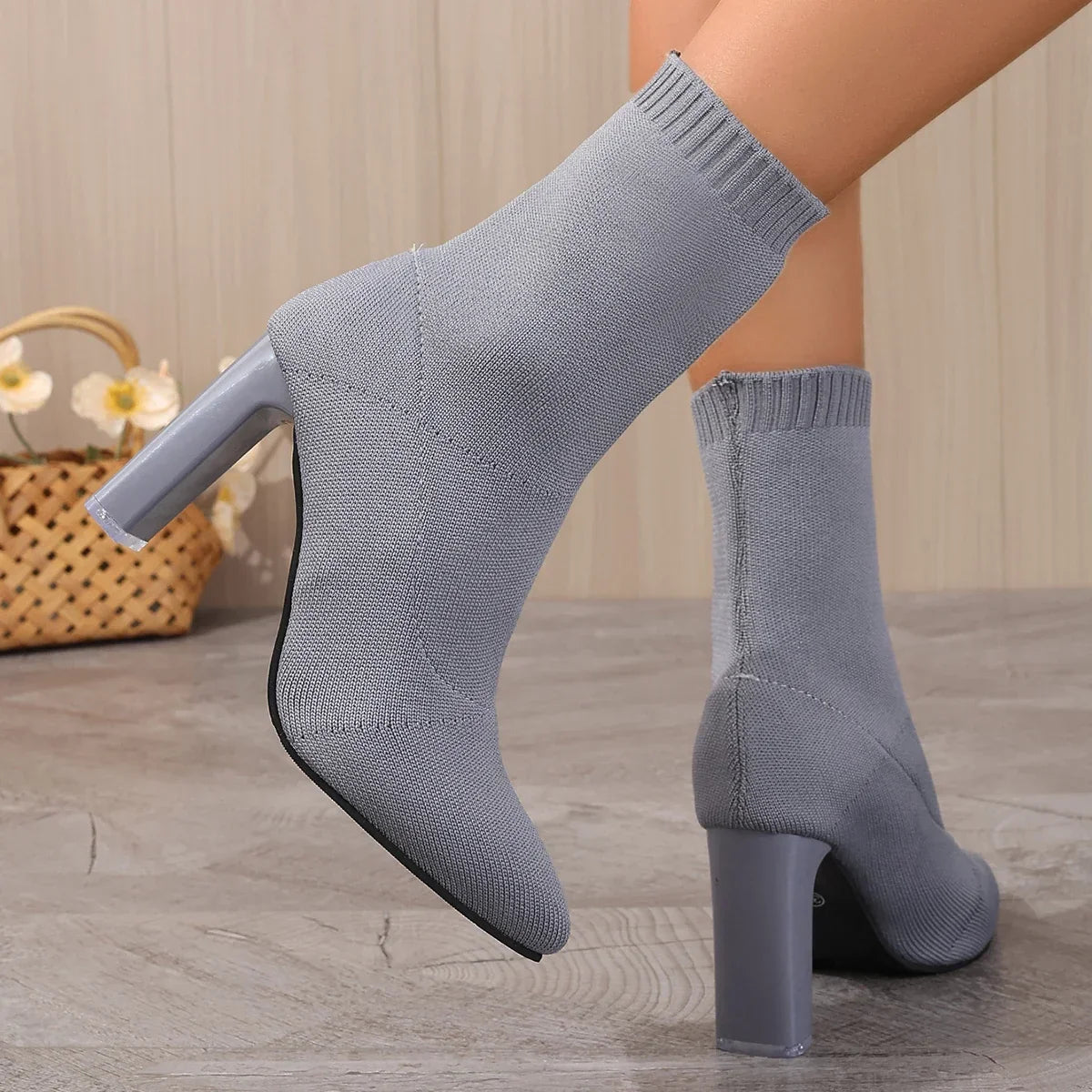 Pale blue knitted sock-boot with seamless stretch-knit upper and sleek ankle-hugging silhouette