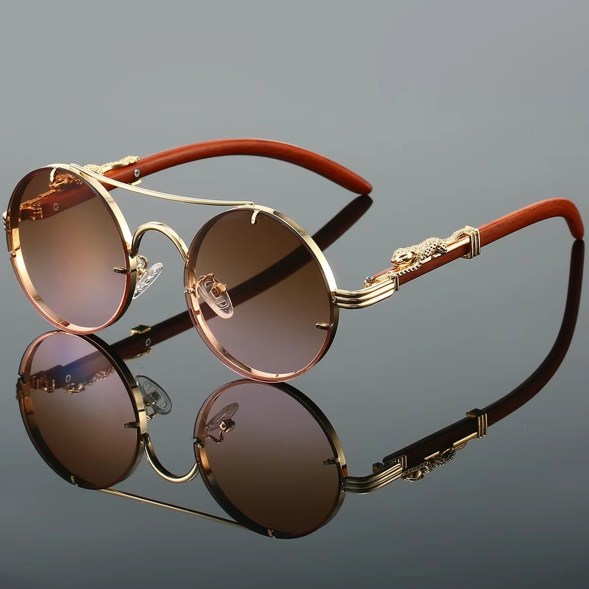 Vintage round unisex sunglasses gold tone double bridge frame red tinted lenses retro style