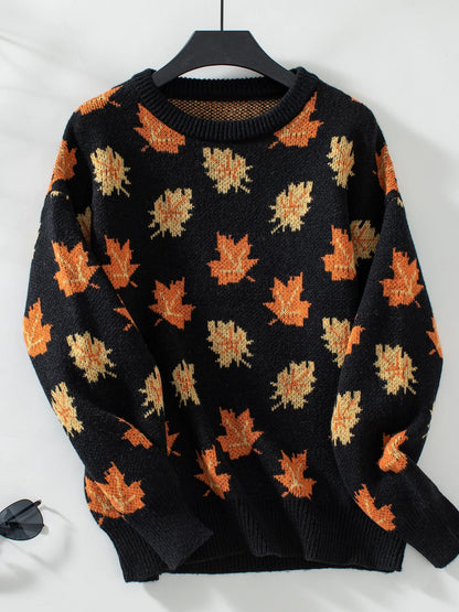 Cozy rust orange woven knit pullover sweater with vibrant autumn leaves pattern and elastic cuffs