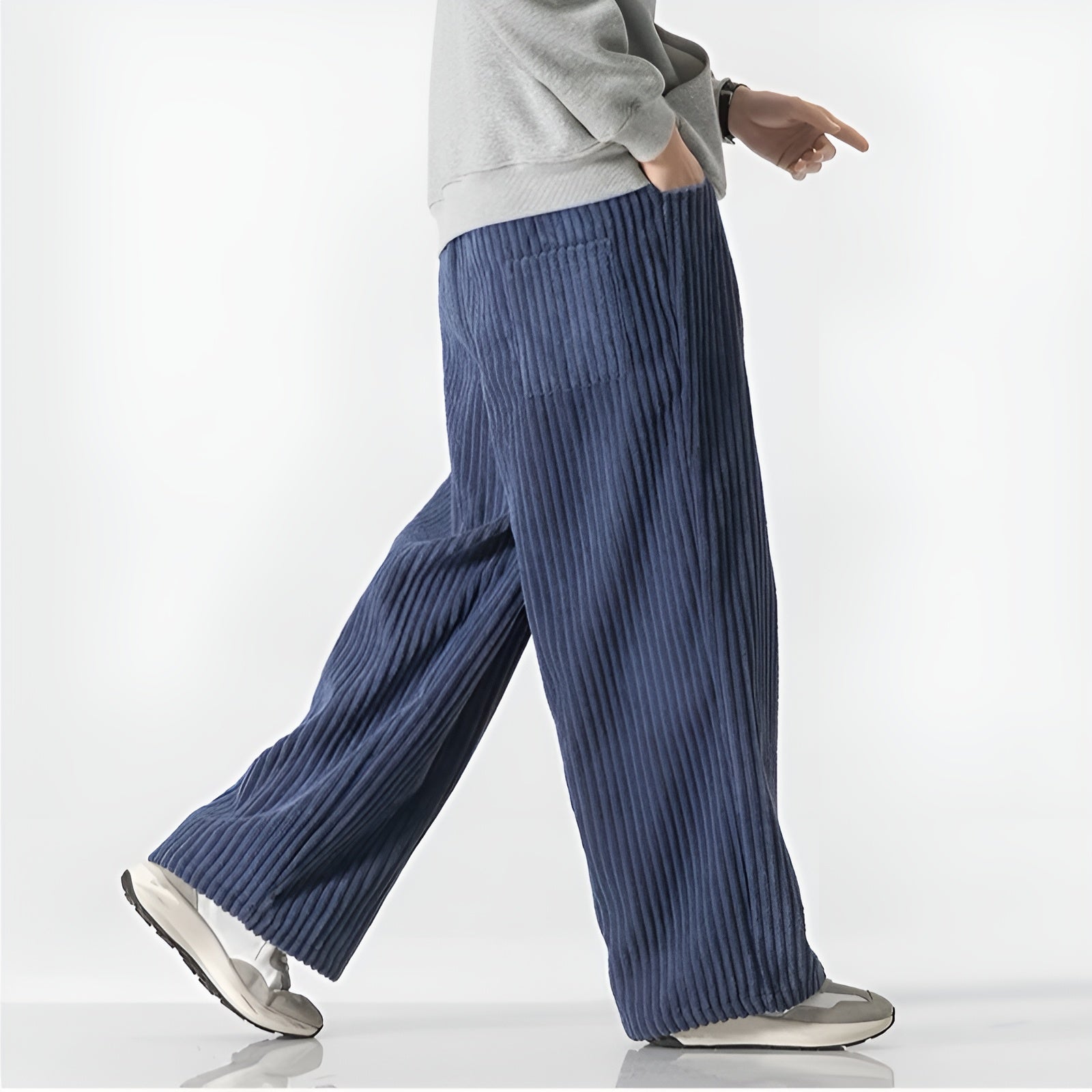 Relaxed corduroy pants with densely ribbed texture, elastic drawstring waist, and easy-fit silhouette