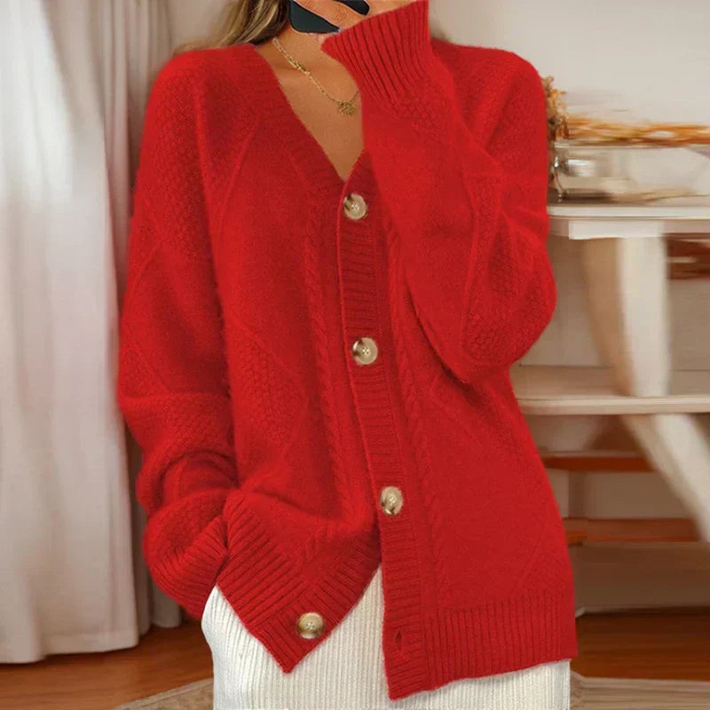 Classic cable knit cardigan in neutral tones, relaxed fit with textured pattern for cozy layering