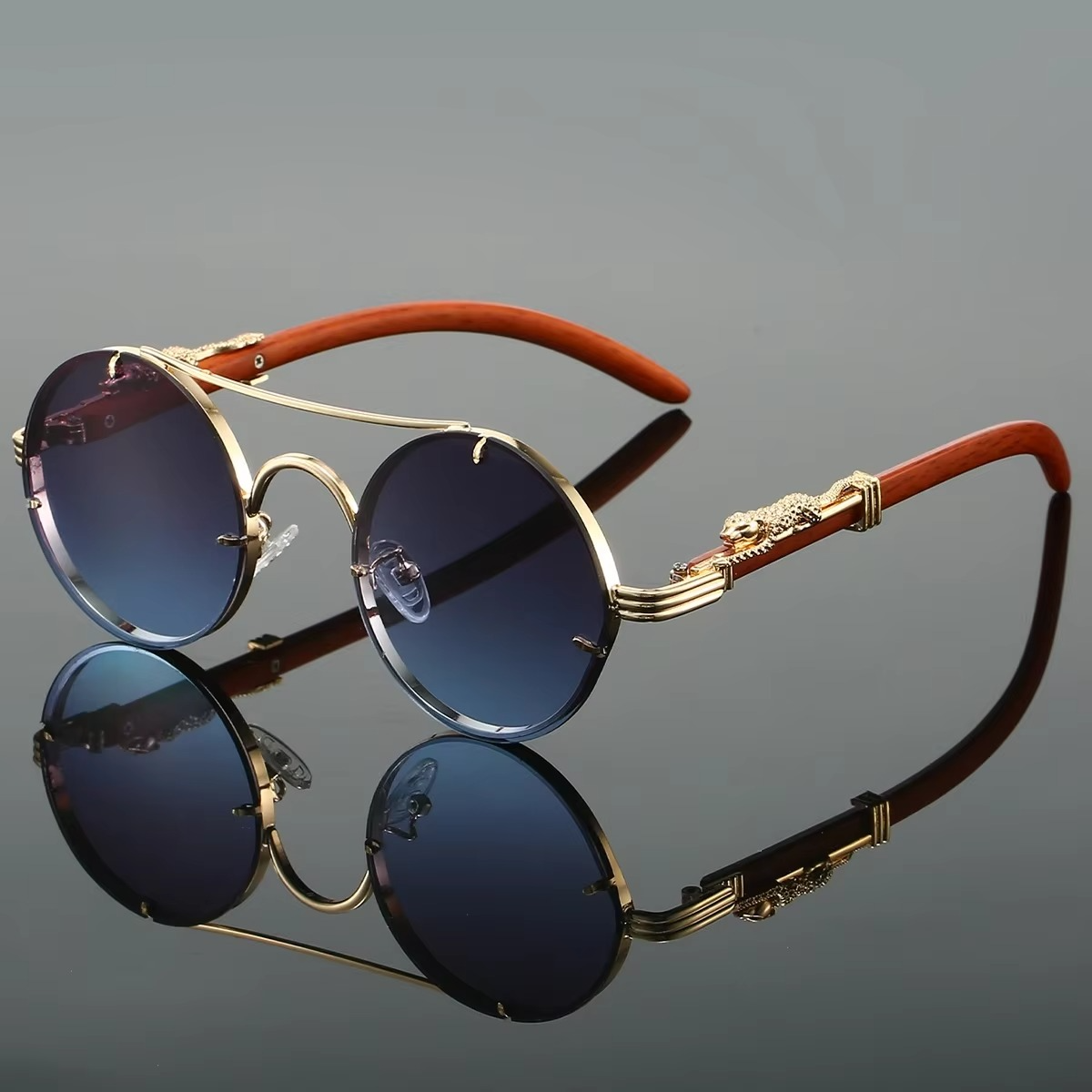 Vintage round unisex sunglasses gold tone double bridge frame red tinted lenses retro style