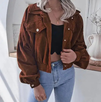 Cropped corduroy short jacket in warm autumn tones with plush texture and structured modern fit