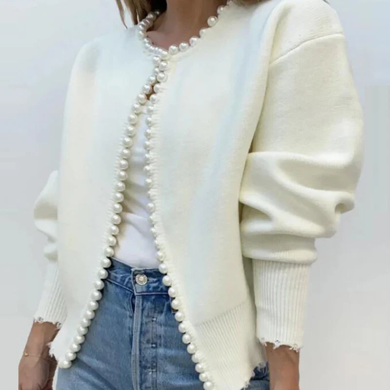 Ivory pearl-lined knit cardigan with maple-leaf jacquard, relaxed fit and ribbed cuffs