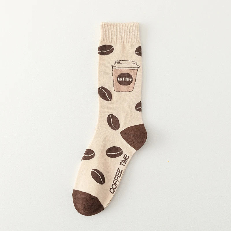 Crew socks with playful coffee cup print, cozy cotton blend in warm tones for coffee lovers