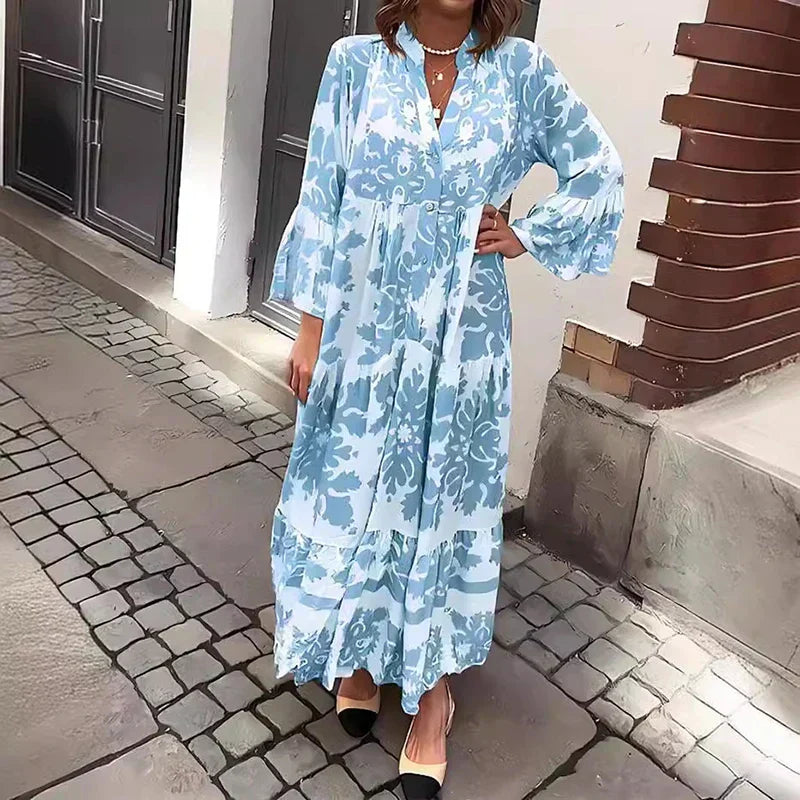 Women's boho flowy printed maxi dress with draped silhouette and vibrant artistic pattern